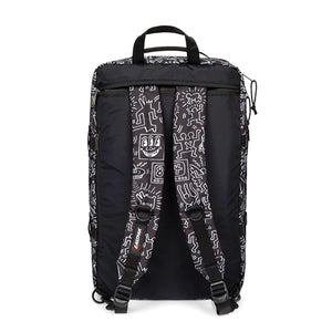 TRAVEL PACK KEITH HARING BLACK - Valigia con Ruote Nera Collaborazione con Keith Haring EK0A5BBR 6Z21 EASTPAK 