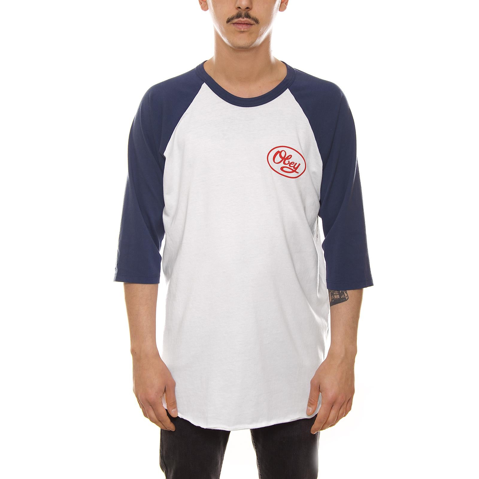 MENDENHALL SCRIPT PREMIUM RAGLAN 3/4 TEE WHITE / NAVY 165761391-WTNV  OBEY 